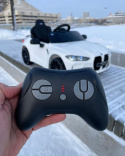 Auto Na Akumulator BMW M4 Białe 2x45W + POWIĘKSZONY AKUMULATOR 12V 14Ah